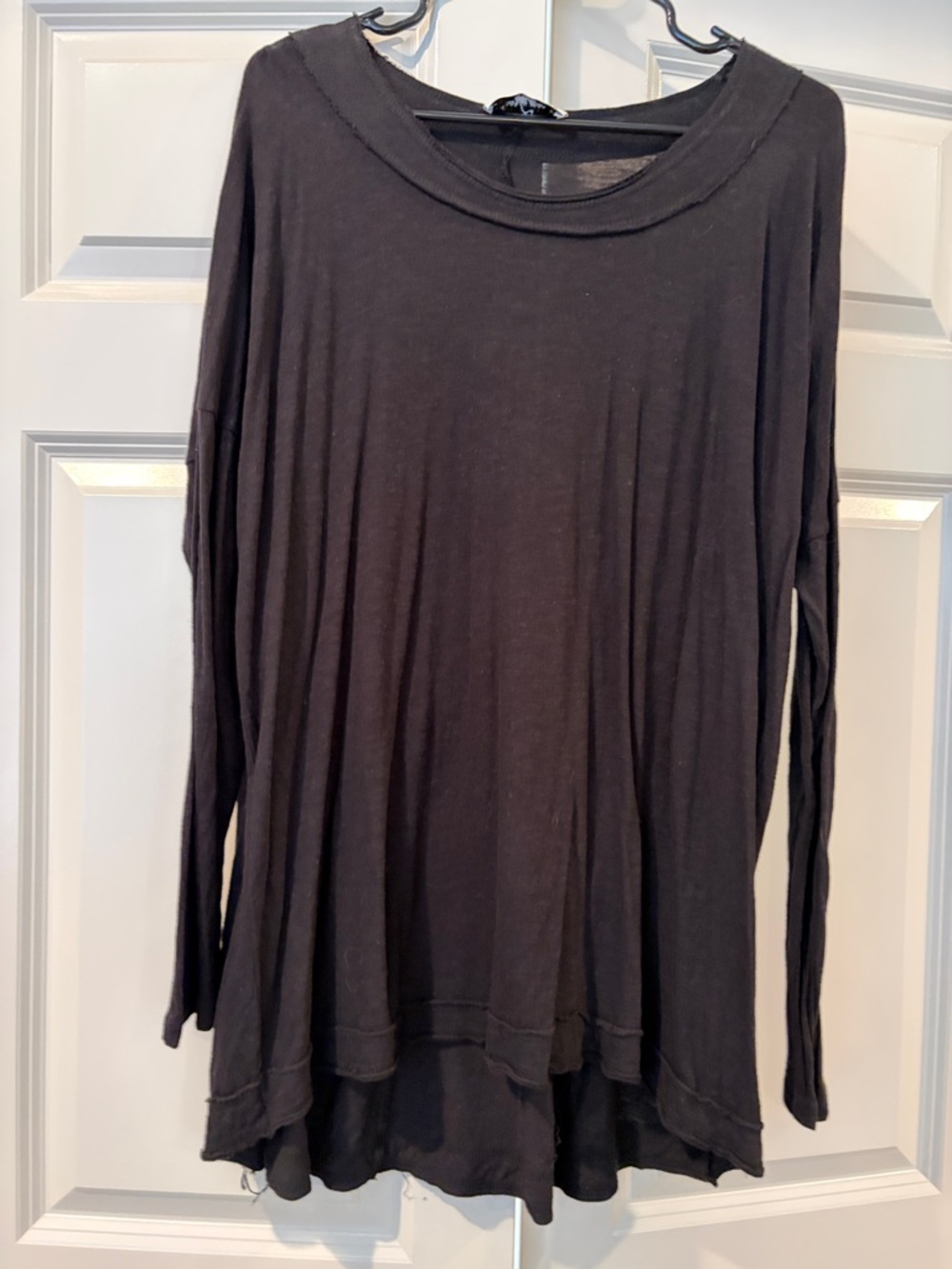 Black relaxed long sleeve tee.